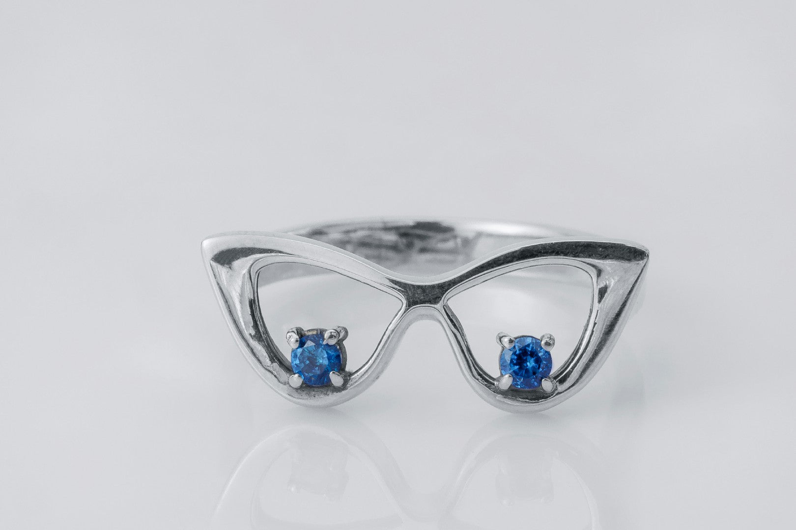 Stylish Glasses Ring with Blue Gems
