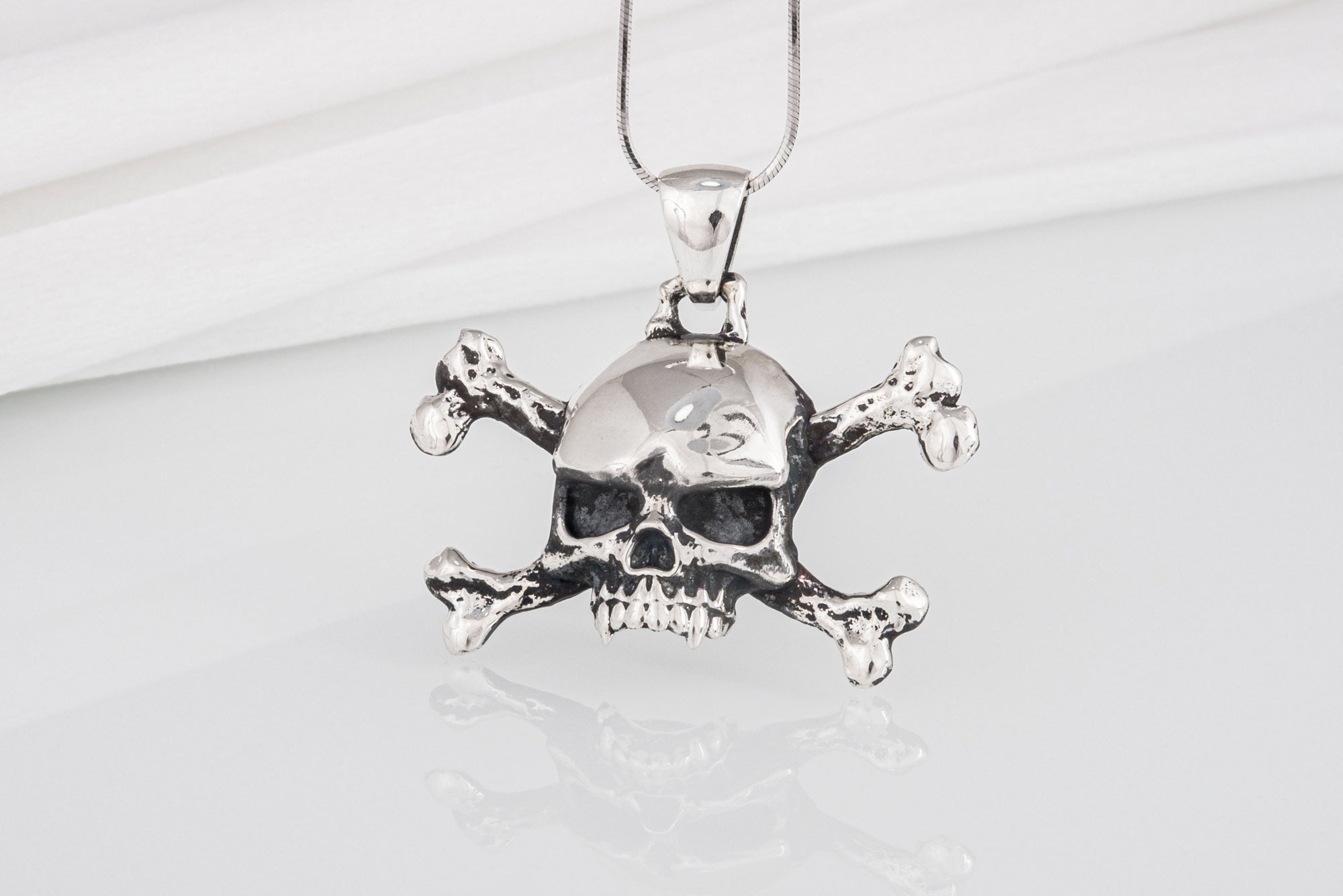 Sterling silver skull and bones handcrafted pendant for bikers and sailors, unique jewelry - vikingworkshop