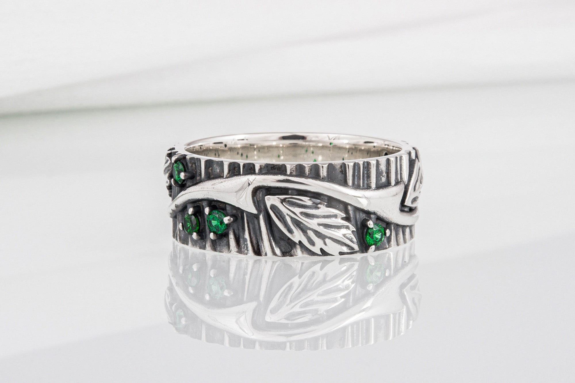 Unique sterling silver tree ring with leaves and green gems, handcrafted fashion jewelry - vikingworkshop