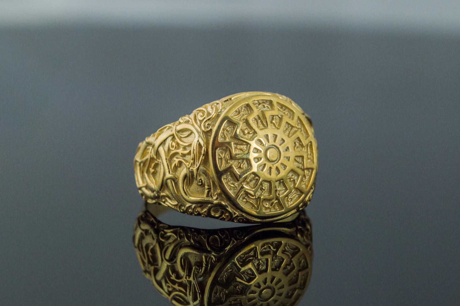 Black Sun Symbol with Urnes Style Gold Norse Ring - vikingworkshop