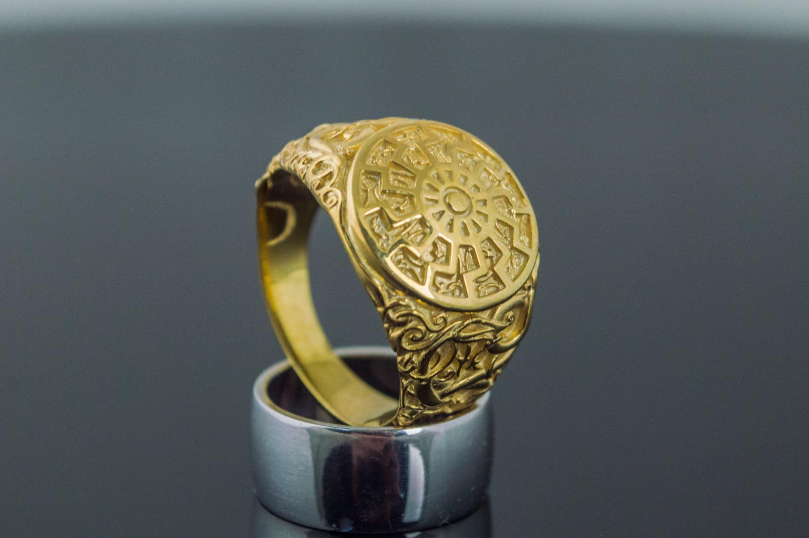 Black Sun Symbol with Urnes Style Gold Norse Ring - vikingworkshop