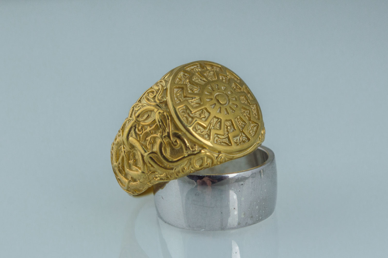 Black Sun Symbol with Urnes Style Gold Norse Ring - vikingworkshop