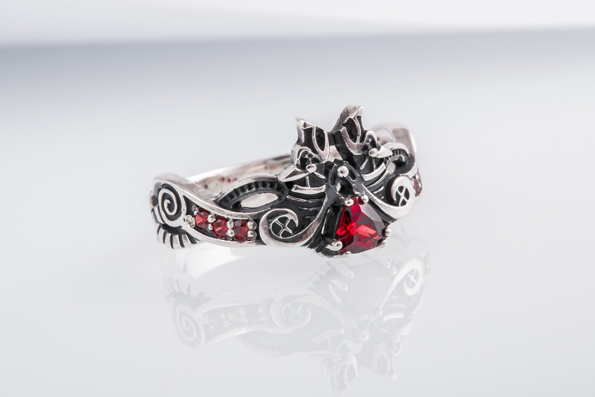 Unique 925 Silver ring with Wolves and Red Gems, handmade Viking jewelry - vikingworkshop